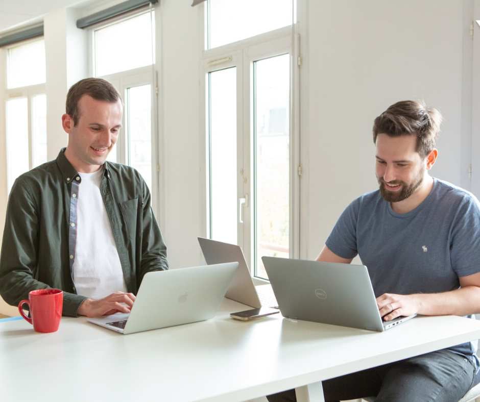 2-engineers-on-laptop